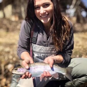 Angela Ziogas, Cross Current Insurance Advisor displays Brook Rainbow catch