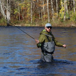 Pete Sconzo, Sales Associate, fly fishing the Farmington River, CT