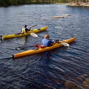 Two kayaks on a lake