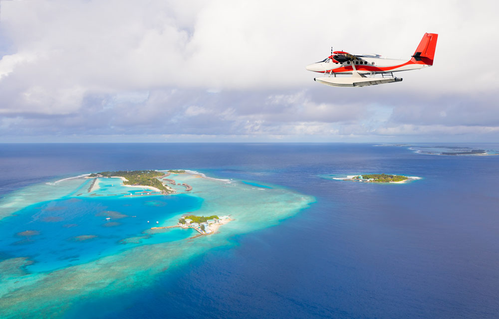 Seaplane flying over the Bahamas
