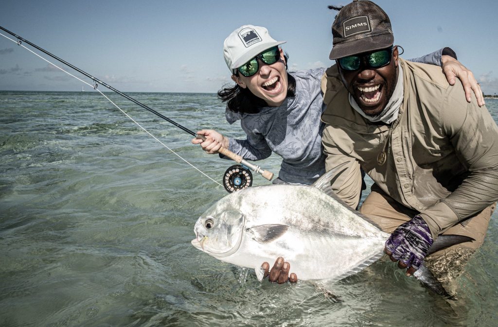 Fly fishing anglers with a Permit in the Berry Islands, Bahamas