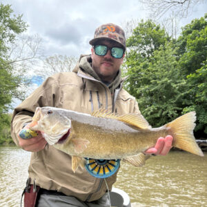 Paul Wagner, Cross Current Insurance guide with a bass